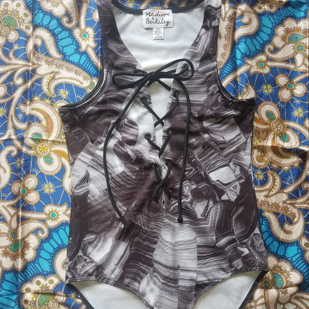 Lace up bodysuit with print (NWOT)